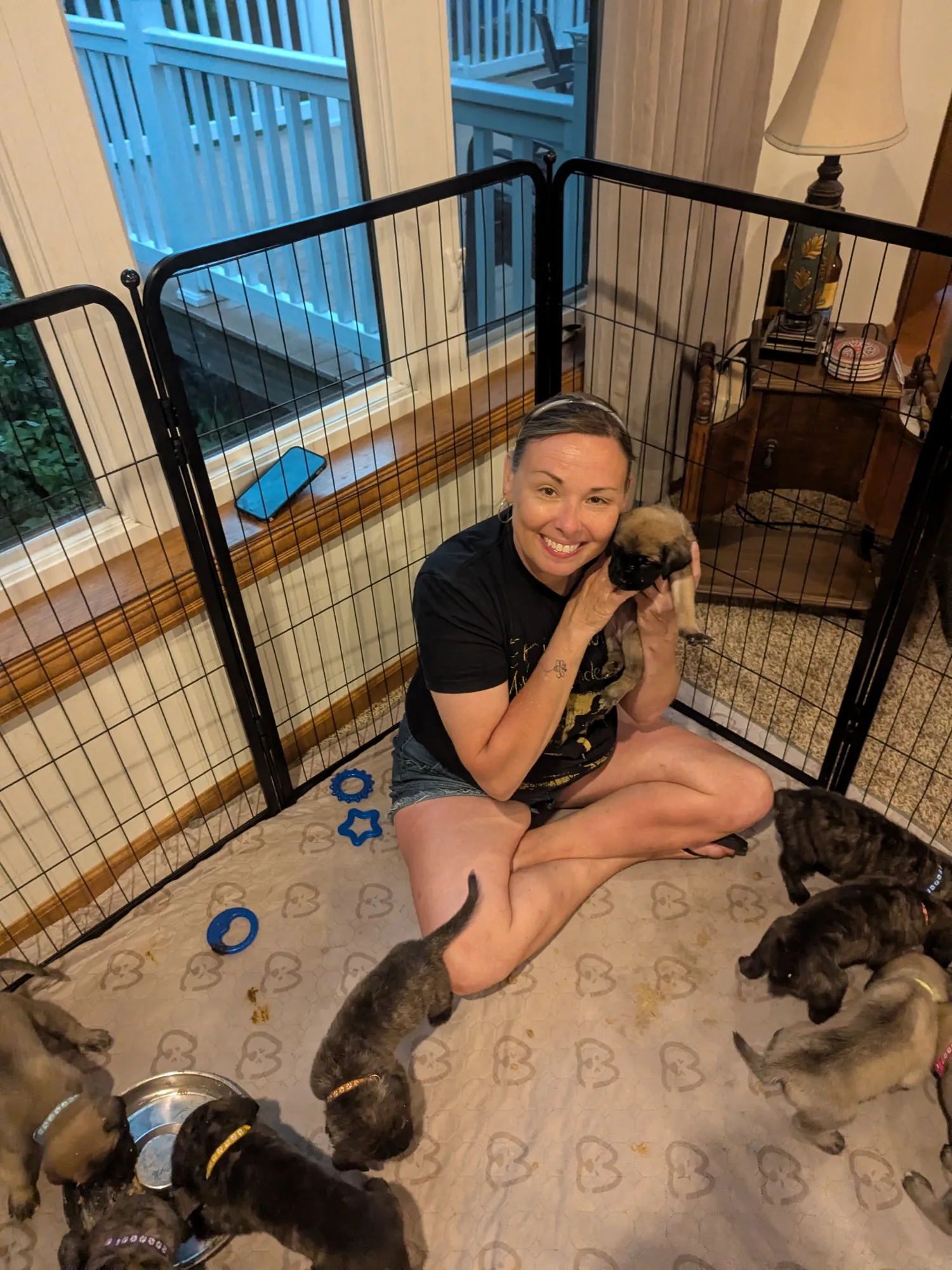 Snuggles in the pen with Abby — week four.