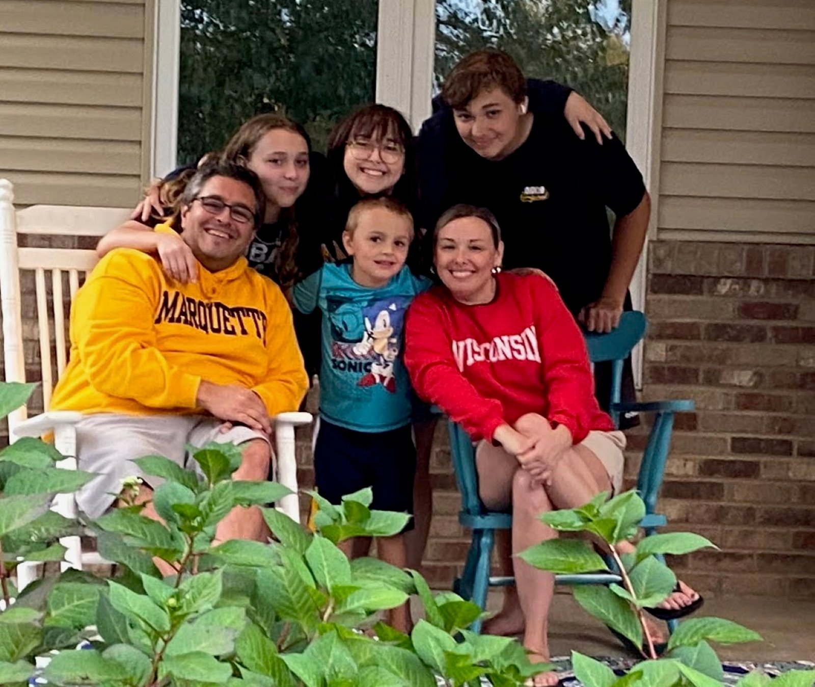 Nolan, Abby, and our four kids on the front porch